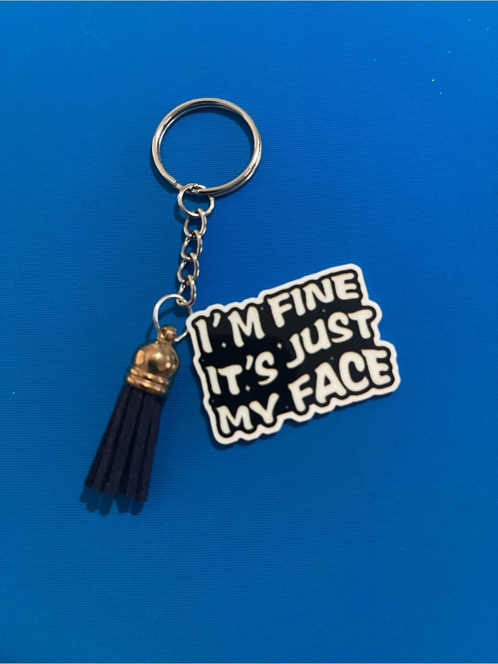 Black & White 'I'm Fine It's Just My Face' Keychain with Tassel